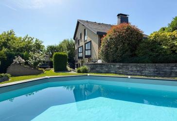 Stilvolles Einfamilienhaus mit Traumgarten und Pool
