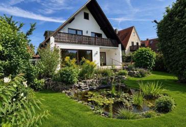 Ihr neues Zuhause in einer der begehrtesten Wohnlagen Erlangens - Großzügiges Architektenhaus mit traumhaftem Südgarten