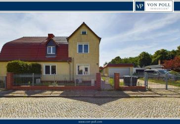 Großzügige Doppelhaushälfte mit Doppelgarage auf großem Grundstück und zusätzlichem Büroraum