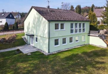 Familienhaus mit Einliegerwohnung, großer Garten und tolle Entfaltungsmöglichkeiten