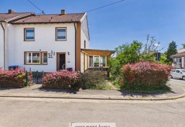 Einfamilienhaus als Reihenendhaus in begehrter Lage, mit Garage, großem Grundstück und Wintergarten!