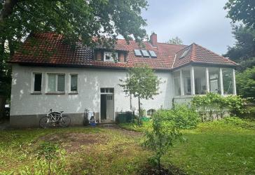 Einfamilienhaus mit parkähnlichem Grundstück in bevorzugter Wohnlage