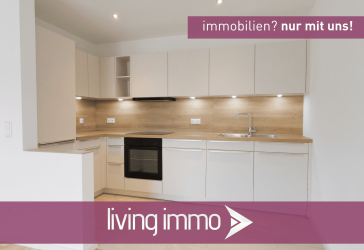 Zentrale Lage, moderner Neubau: Erstbezug mit Balkon, EBK & TG-Stellplatz