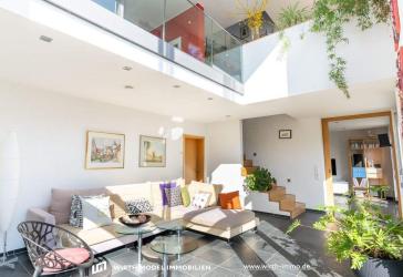 Architektonisch ansprechendes freistehendes Einfamilienhaus mit Galerie in Bestlage | Energie A