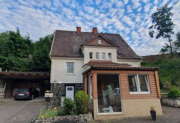 Traumhaftes Einfamilienhaus mit großem Gartenparadies in ruhiger Ortsrandlage