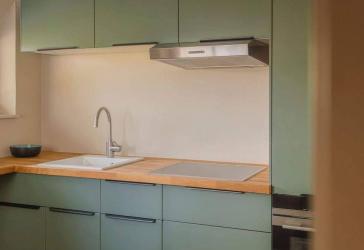 Stilvolle Reetdach-Maisonette mit offenem Wohnbereich, Gaubenlicht und Südterrasse