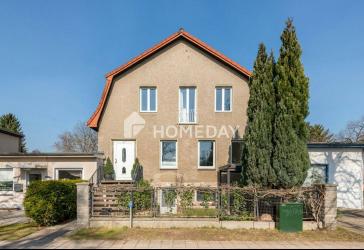 Gepflegtes Mehrfamilienhaus mit 2 Wohneinheiten, Friseur, Werkstatt und Lager