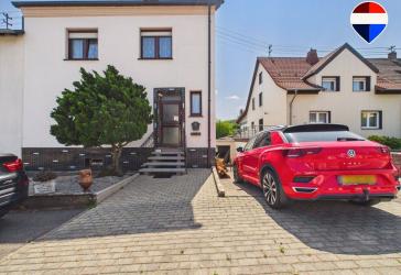 Doppelhaushälfte in Siersburg mit idyllischem Garten und Entwicklungspotenzial