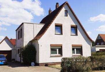 Vielseitiges Ein- oder Zweifamilienhaus in Bümmerstede mit Terrasse, Garage und attraktivem Grundstück
