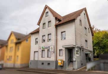 Wohn- und Geschäftshaus mit Gaststätte und Biergarten in Waiblingen