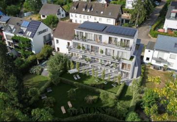 Die Gartengeschosswohnung KfW QNG - Wohnen wie im eigenen Haus mit idylischem Garten am Waldrand