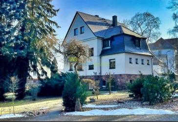 Idyllisches Wohnen am Kurpark - Großzügiges Zweifamilienhaus mit Pension bzw. Einliegerwohnung