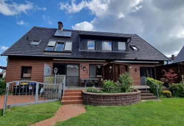 Zweifamilienhaus zum Wohnen und Arbeiten in Hille-Hartum