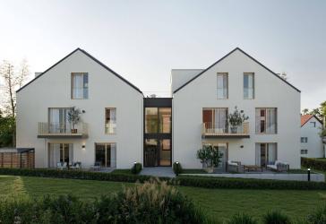 Moderner Erstbezug: 2-Zimmer-Neubau mit Tiefgaragenstellplatz und Gartenabteil