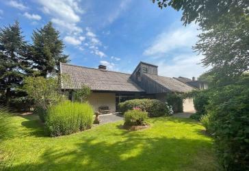 Architektonisch reizvolles Einfamilienhaus mit Galerie, Kamin und Garten in Nienberge!