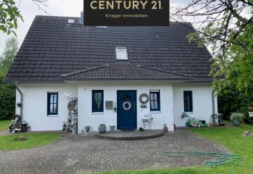 Schickes Einfamilienhaus + Gewerbe auf einem Grundstück in Munster!