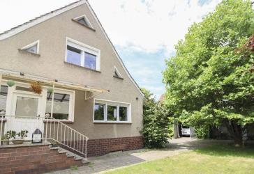 Ein Anwesen voller Möglichkeiten - Charmantes Einfamilienhaus mit einzigartigem Nebengelass