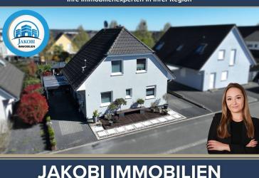 Modernes Einfamilienhaus mit PV-Anlage, zwei Carports, Garage und Wallbox in Weilerswist Süd!