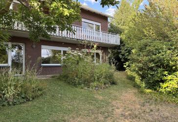 Einfamilienhaus mit Einliegerwohnung in Kloster-Oesede