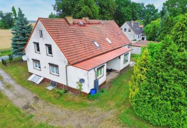 Grundstück mit geräumigen Siedlungshaus in ruhiger Lage