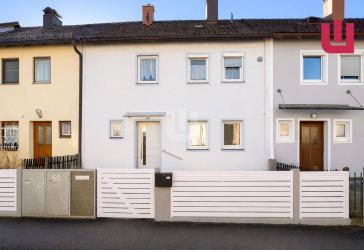WINDISCH IMMOBILIEN - Halbes Reihenhaus mit Garten in guter Lage zum Preis einer Wohnung