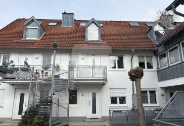 Wohnen auf drei Ebenen - stilvolle Maisonette mit Balkon.