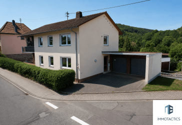 Voll vermietetes 3-Familienhaus mit 3 Garagen, Garten & weiterem Mietpotenzial