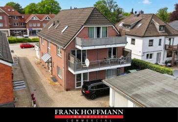 Wohn-/ Geschäftshaus mit 5 Einheiten & 7 Garagen in Norderstedt
