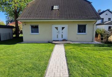 Einziehen statt Renovieren - hochwertig saniertes Familienhaus mit Erdwärme und Traumgarten