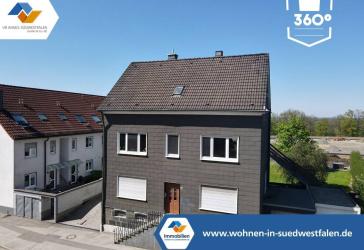 VR IMMO: Gepflegtes Zweifamilienhaus mit Garten und 2 Garagen