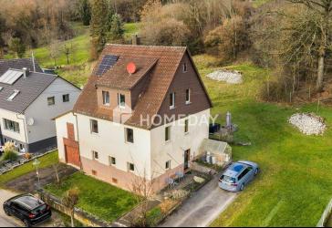 Familien aufgepasst! Gemütliches Einfamilienhaus mit schönem Grundstück in ruhiger Ortsrandlage