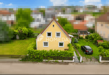 Familienfreundliches Einfamilienhaus mit Dachterrasse und schönem Garten