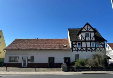 Gemütliches Einfamilienhaus mit separater Gewerbefläche und sonnigem Garten