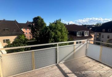 Urbanes Lebensgefühl, lichtdurchflutetes Wohnen mit sonniger Dachterrasse im Herzen Rosenheims