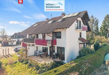 Großzügige, vermietete Doppelhaushälfte mit Garten und separater Garage