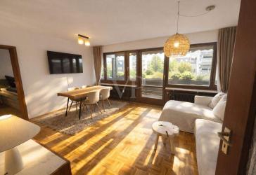 Kurze Wege zu Ort & See: Helle 2-Zi.-Wohnung mit großem Balkon und TG