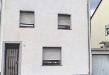Charmantes Einfamilienhaus mit Terrasse und großem Entwicklungspotenzial