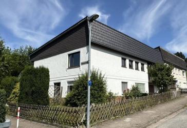 Reihenendhaus mit zusätzlicher Einliegerwohnung in familienfreundlicher Lage