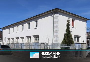 Eigentumswohnung mit Gewerbemöglichkeit und Lagerhalle