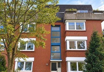 Attraktive Kapitalanlage in gefragter Wohnlage – Gepflegtes 4-Familienhaus mit 4 Garagen, provisionsfrei!