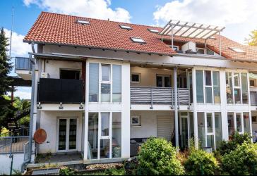 Lichtdurchflutete Erdgeschosswohnung mit Wintergarten & Süd-Terrasse in gefragter Wohnlage