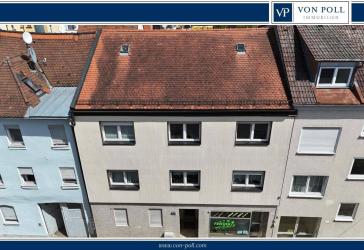 Gepflegtes Mehrfamilienhaus mit soliden Einnahmen in zentraler Lage