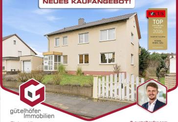 Modernisiertes Zweifamilienhaus mit Einbauküchen, Garage und großem Garten in zentraler Lage