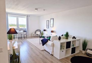 (PROVISIONSFREI) Urbanes Wohnen mit Panorama: Saniertes Apartment mit Balkon und beeindruckendem Fernblick in Schwachhausen
