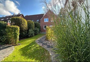 Sanierte 3,5-Zimmer-Erdgeschosswohnung mit Garten und Garage