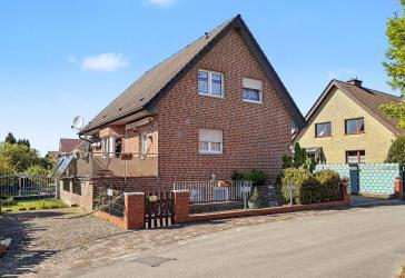 Familienfreundliches Einfamilienhaus in gepflegter Siedlungslage von Hasbergen