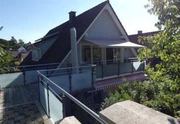 Gepflegte Terrassenwohnung mit Gartenanteil