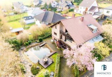 Großzügiges Wohnhaus mit Garten, Schwimmteich & Sauna - Viel Platz auf separaten Ebenen