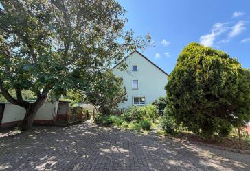 Platz für die ganze Familie - Einfamilienhaus mit großem Garten und Nebengebäude