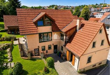 GLOBAL INVEST IMMOBILIEN SINSHEIM | Einfamilienhaus im Landhausstil - modernisierter Altbestand und moderner Anbau